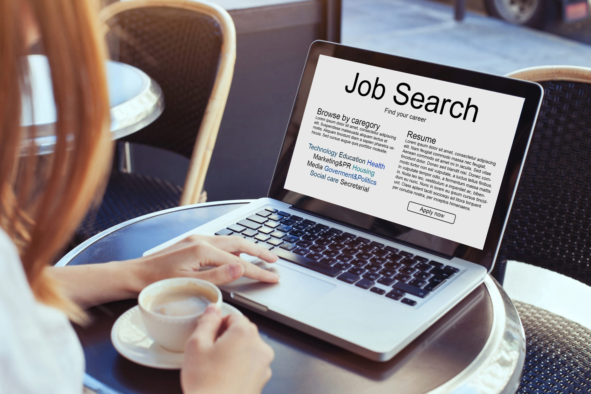 Image of person on computer searching for a job