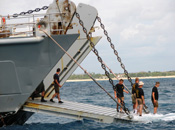 Military divers on the U.S. Army's landing craft